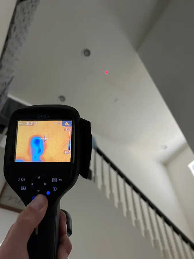 Thermal imaging leak detection identifying water heater damage in a home